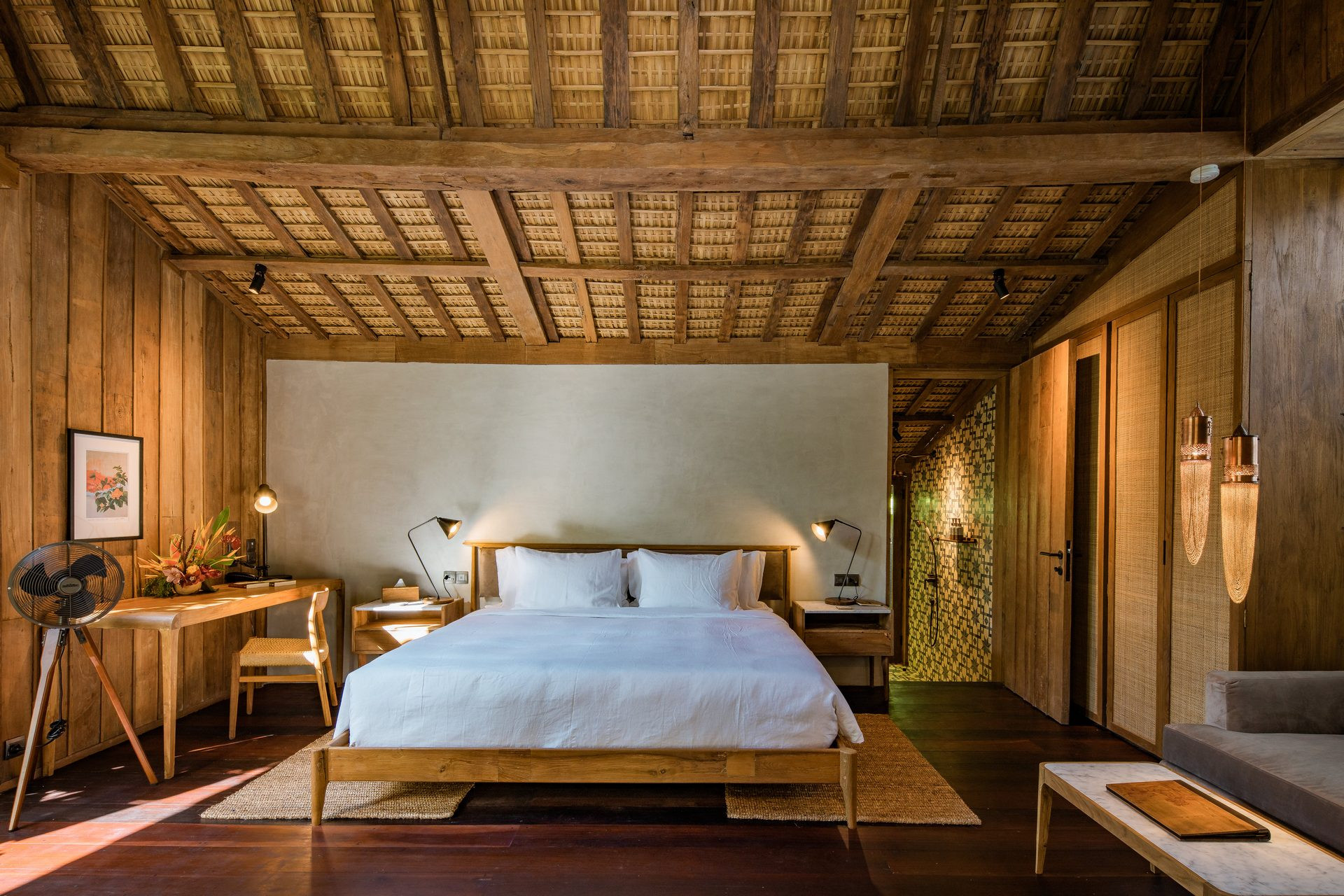 The Asa Maia restored Javanese gladak suite interior — century-old teak accommodation, Bali