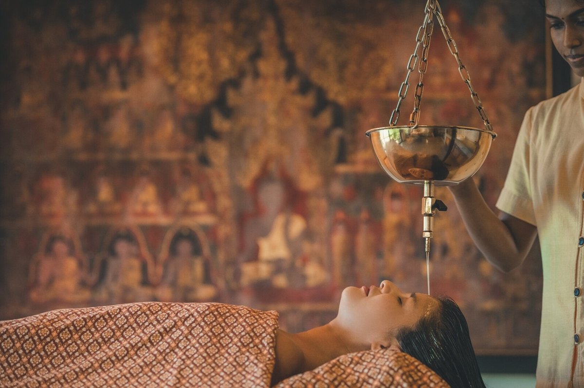 Grand Resort Bad Ragaz Shirodhara Ayurvedic treatment — traditional oil therapy for deep relaxation and wellness