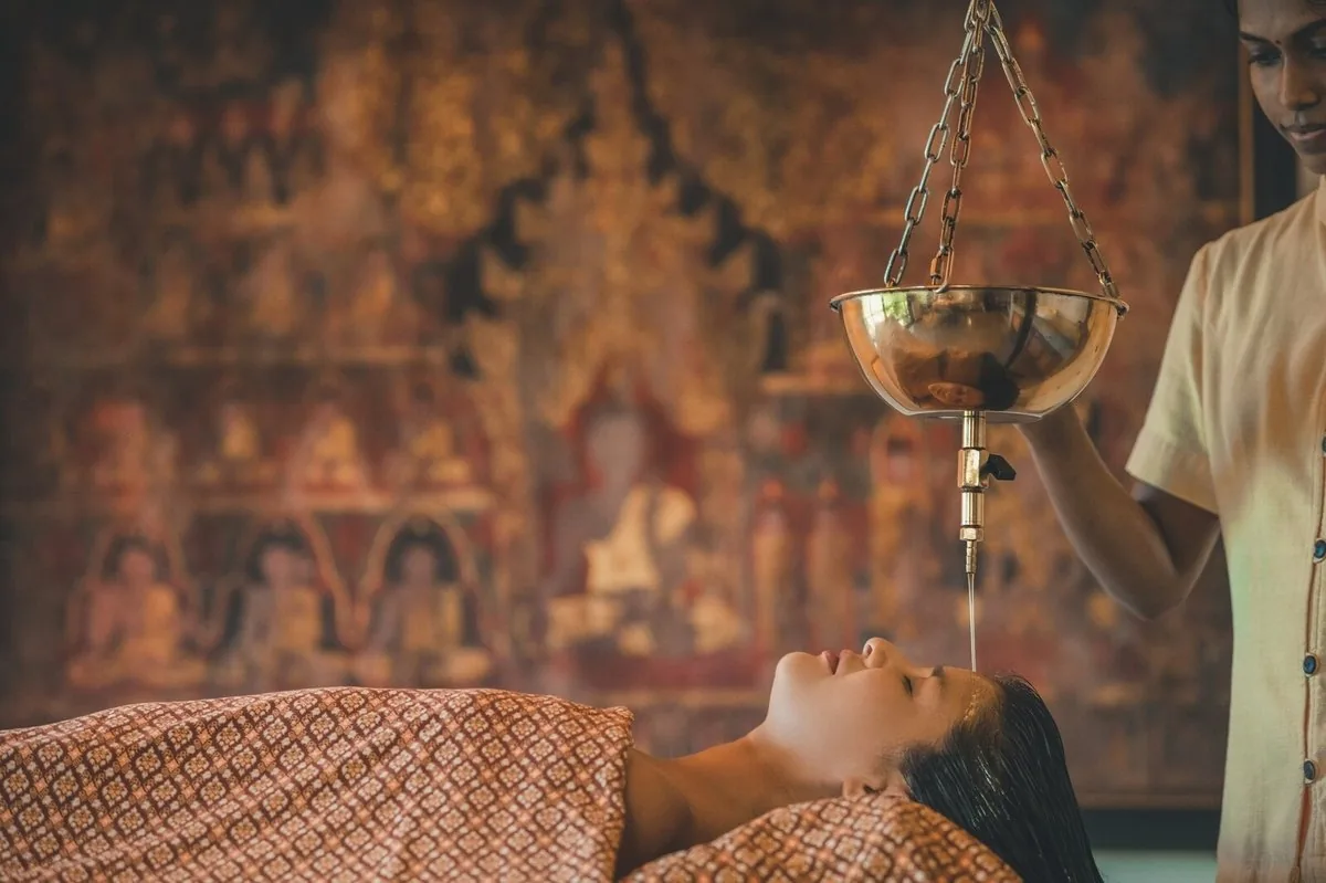 Grand Resort Bad Ragaz Shirodhara Ayurvedic treatment — traditional oil therapy for deep relaxation and wellness