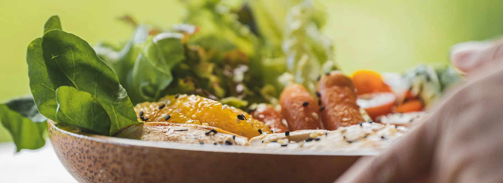 Open-air dining pavilion serving wellness cuisine overlooking tropical gardens at Kamalaya Koh Samui